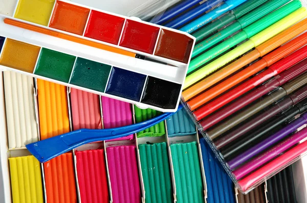 Water colour paints, felt-tip pens