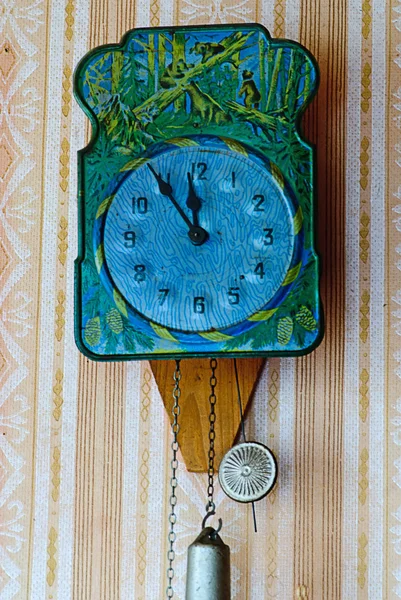 Clock With Hanging Weights and pendulum