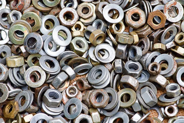 Nuts and washers in a drawer of hardwa
