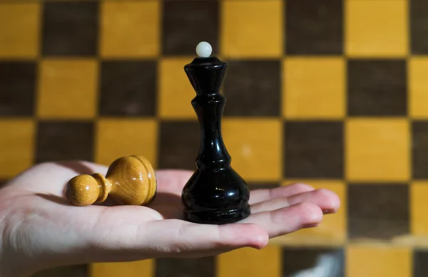 Queen versus pawn