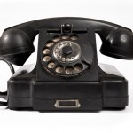 Old black phone with dust and scratches — Foto Stock