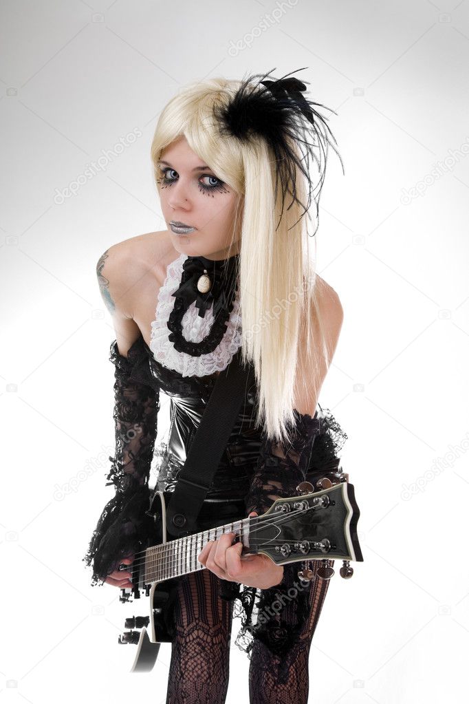 Gothic girl with artistic makeup studio shot over white background
