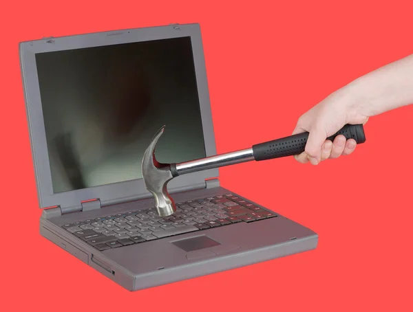 The laptop and hammer