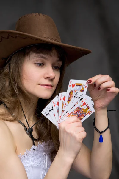 Portrait girl with a playing-cards
