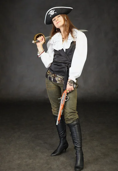 Girl dressed as pirate with sword