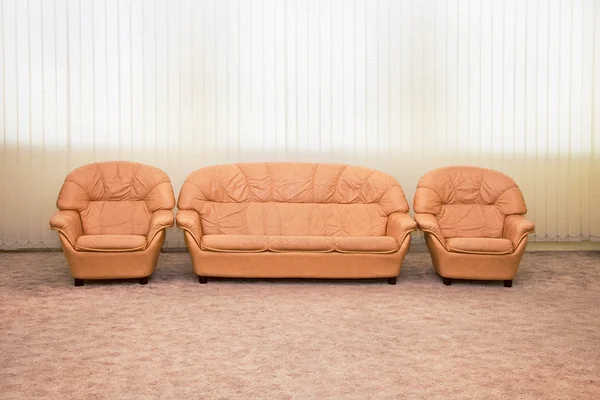 Leather armchairs and sofa