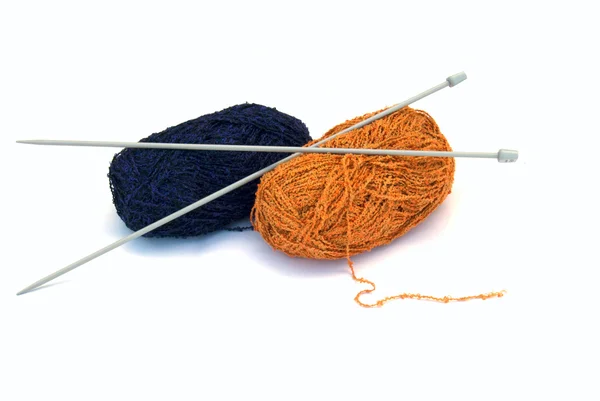Wool and knitting needles - isolated