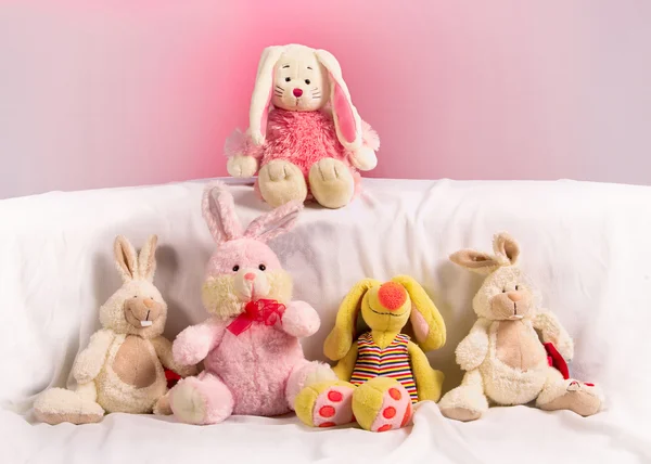 Five toy rabbits