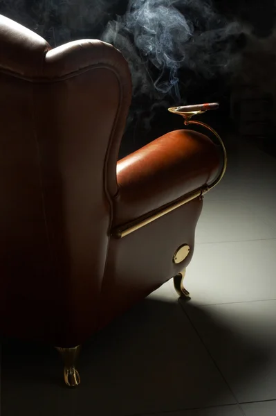 Cigar and armchair