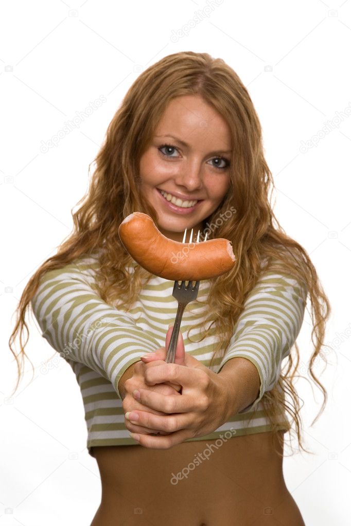 Girl eats sausage — Stock Photo © skutin 1044224