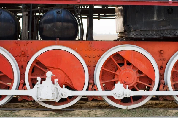 Old locomotive wheels.