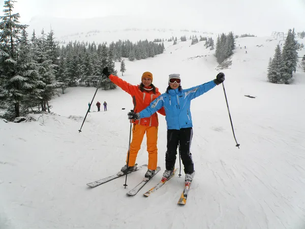 Females snow skiing
