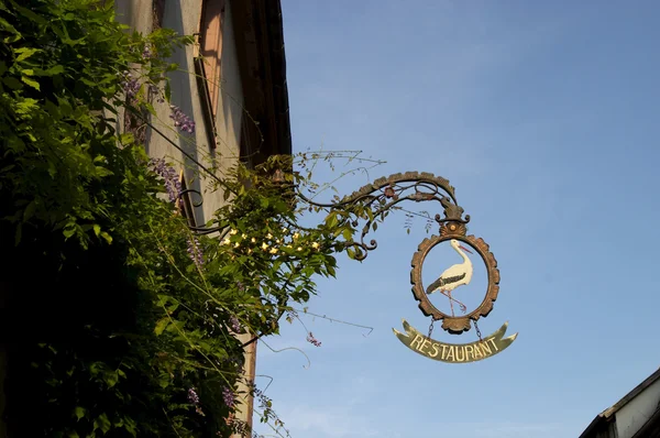 Riquewihr stork restaurant sign