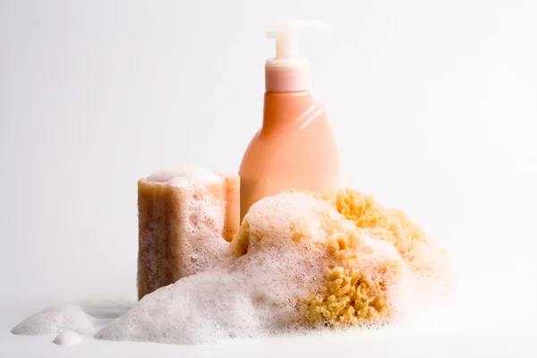 Soap, natural sponge and shower gel