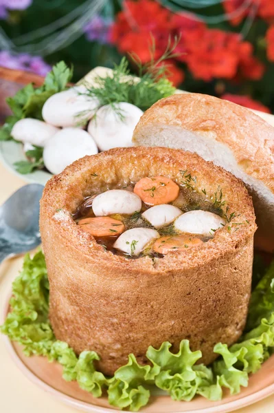 Mushroom soup in bread bowl