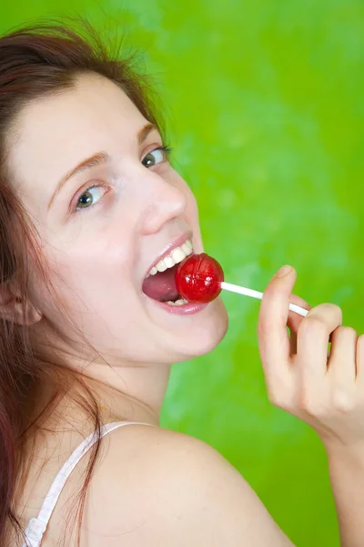 Sexy girl licking lollipop by Iakov Filimonov Stock Photo girl licking girl