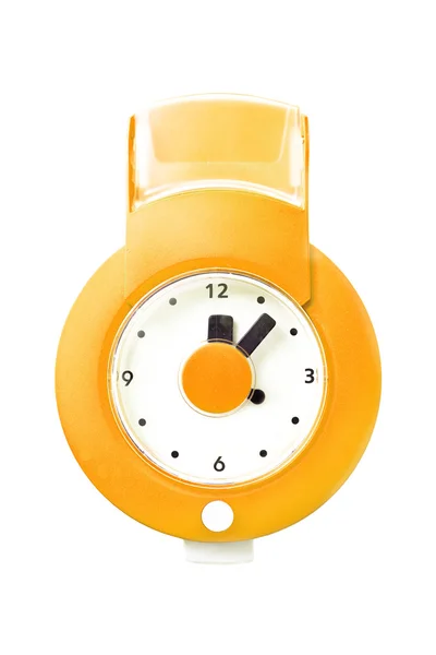 Yellow watch on a white wall