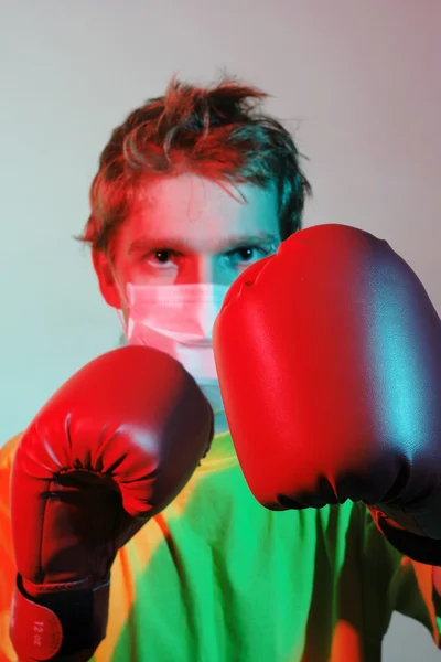 Doctor in red boxing gloves
