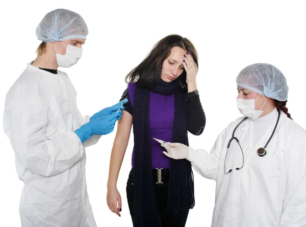 Women getting a flu shot from his doctor