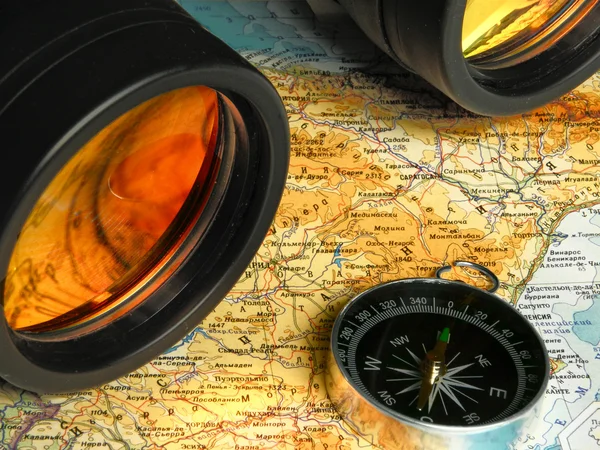 Map compass and binoculars