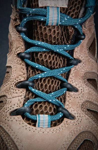 Close up of hiking boots shoelace