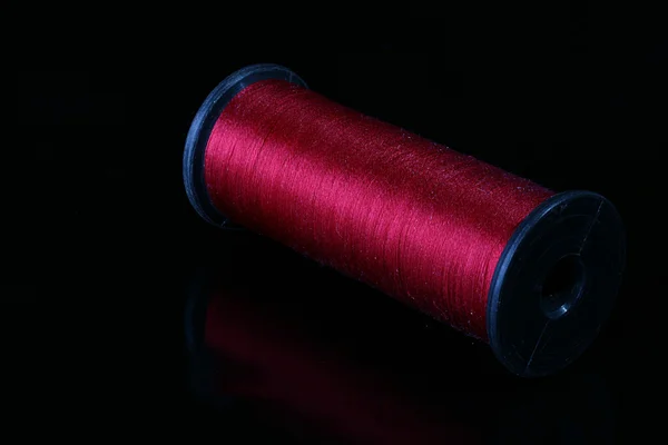 Darkly red threads