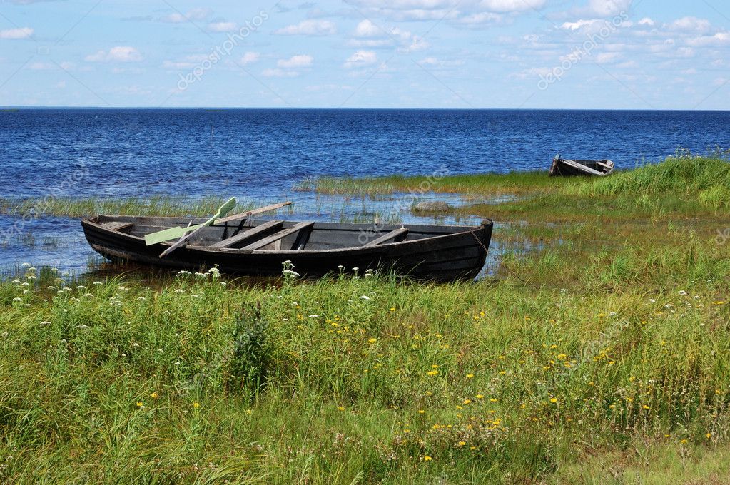 Landscape of lake bank with fishing boat — Stock Photo © viknik 