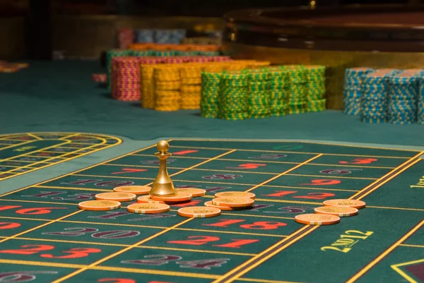 Roulette gambling chips on the table