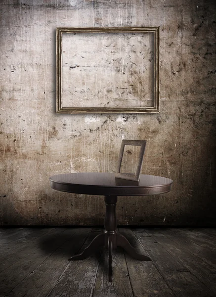 Table and old photo-frame