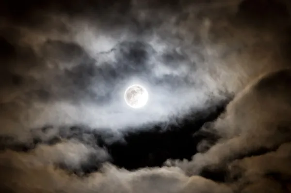 Bright full moon and clouds