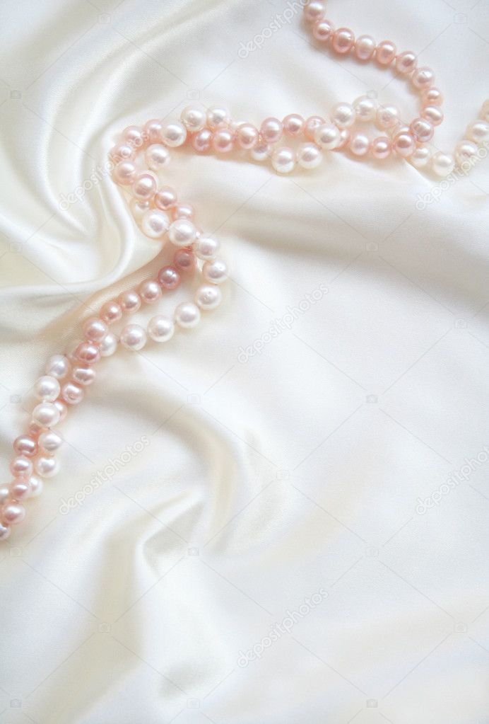 Smooth elegant white silk with white and pink pearls can use as wedding
