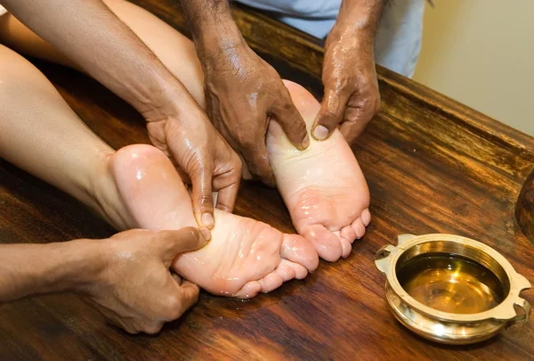 Indian ayurvedic oil foot massage