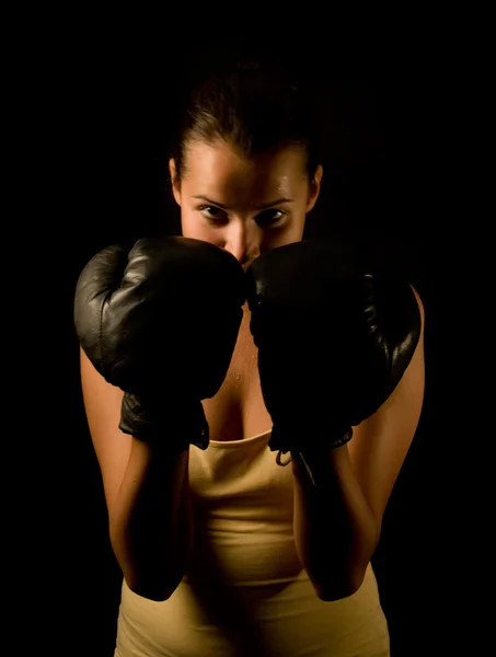 Girl in black boxing