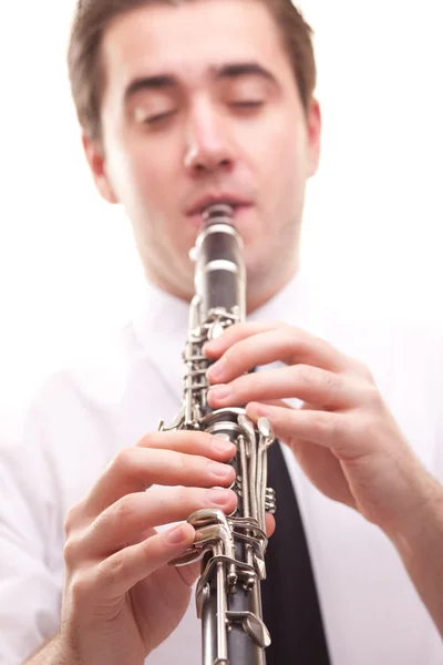 man playing clarinet