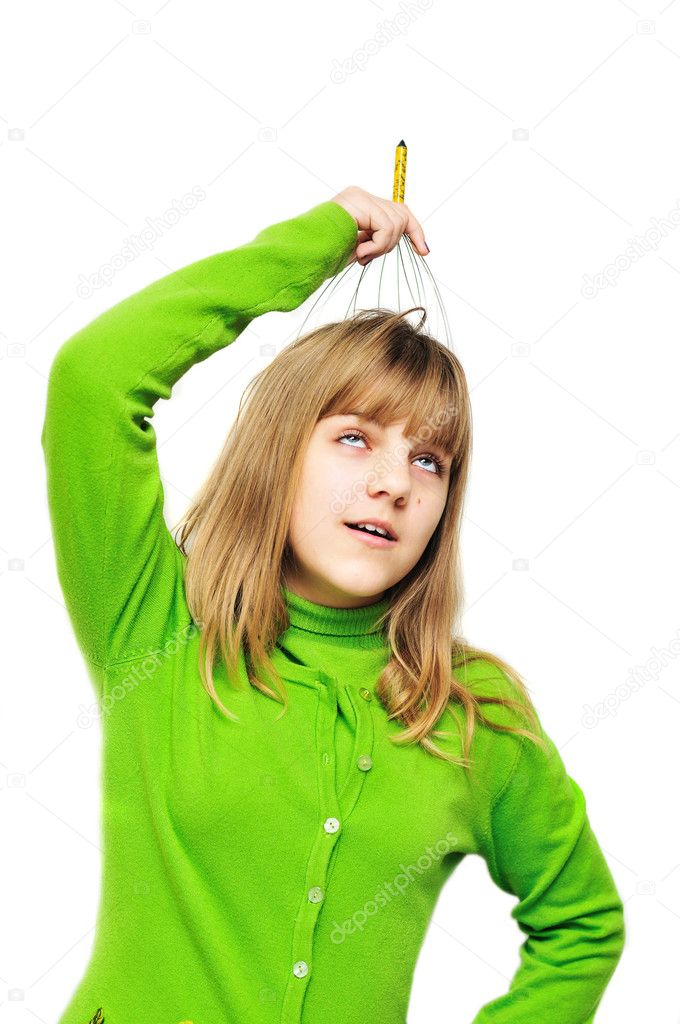 Teen girl enjoying using head scalp massage