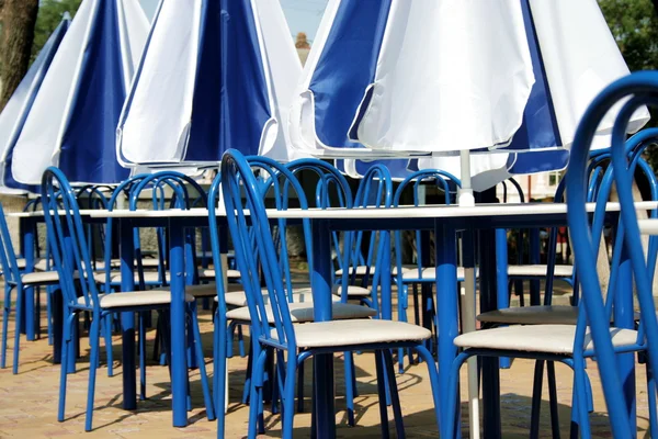 Summer cafe in white-blue colors