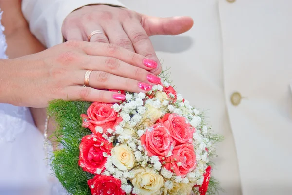 Wedding bouquet hands and rings by Alena Ozerova Stock Photo