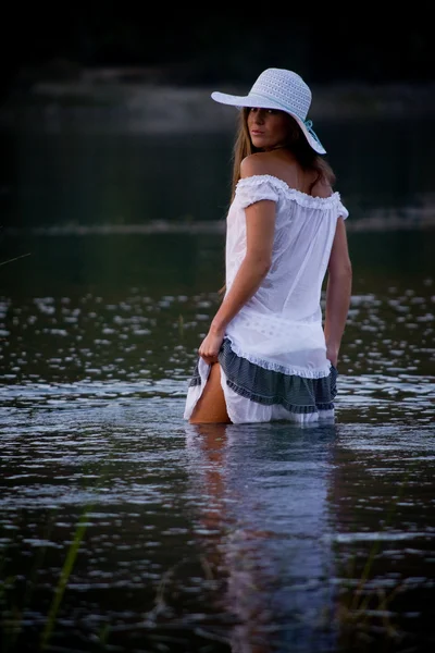 Sexual model posing in water