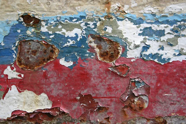 Eroded old paint on metal surface