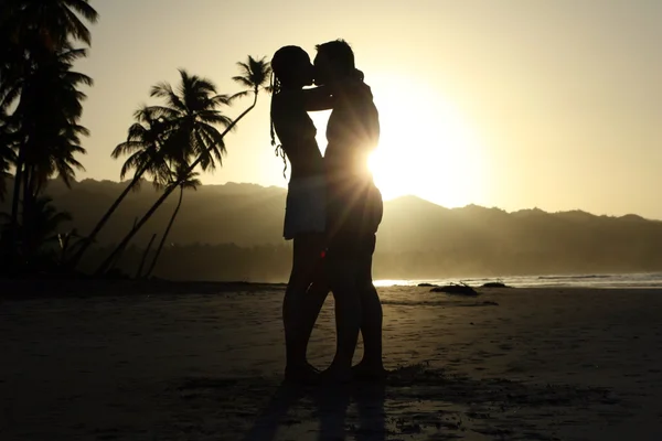couple kissing silhouette. Silhouette kissing Couple