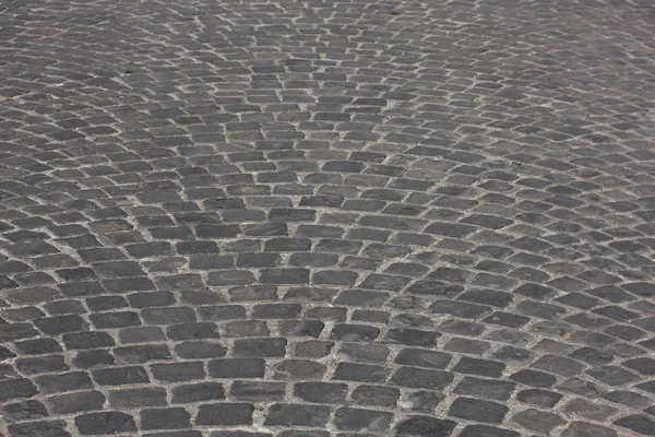 Old medieval granite cobble road