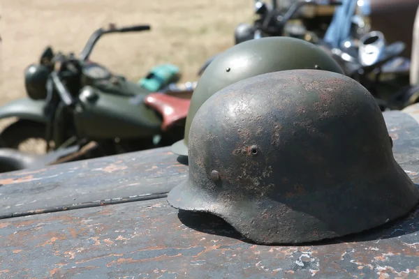 Two military soldier metallic helmets