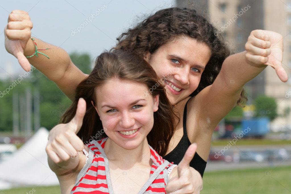 Two teen girls show thumbs up signs depositphotos 1446267 Two teen girls ... up to fuck cute teen boy's mouth & help him ride ramrod in special way: