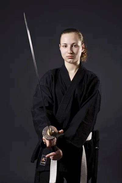Female samurai holding katana