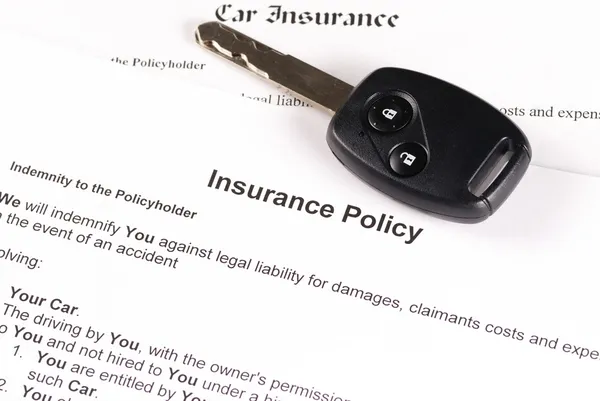 Car key on an insurance policy