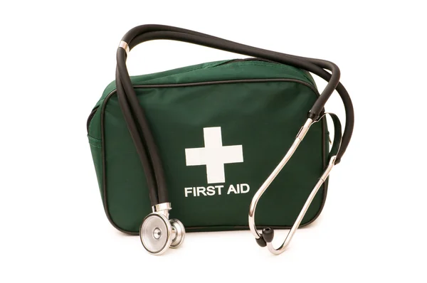 First aid kit and stethoscope isolated
