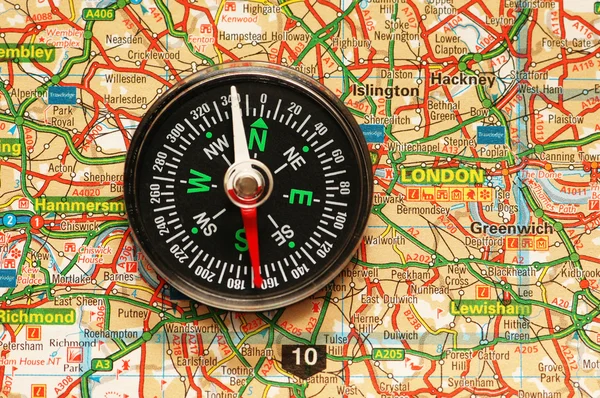 Compass over the map of UK