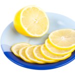 depositphotos_1508855-Ripe-yellow-lemon-on-dark-blue-saucer.jpg