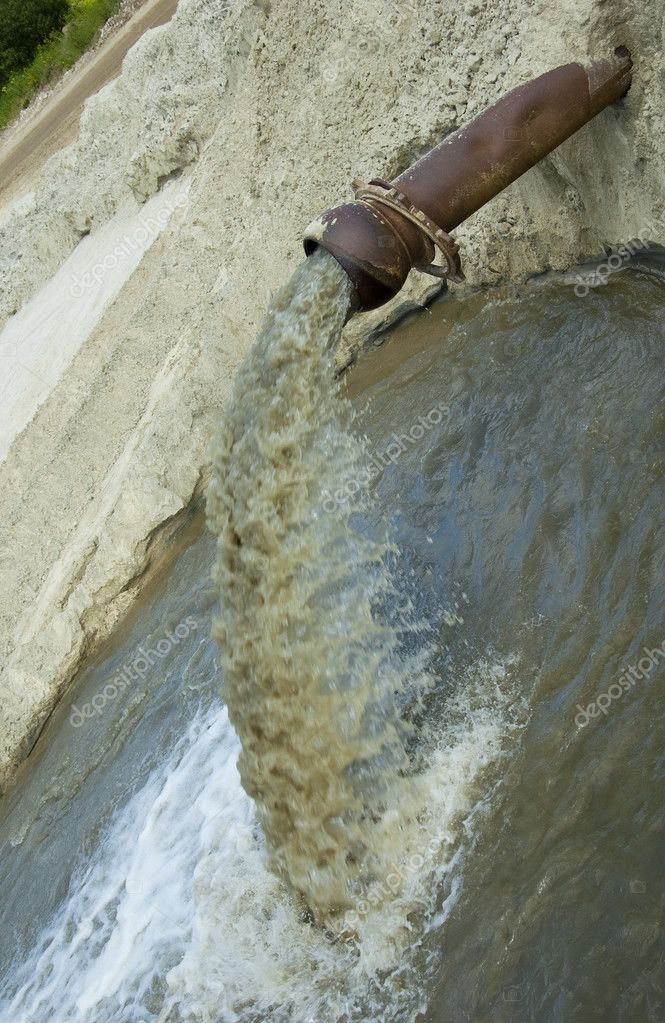 Dirty water flows from a pipe. — Stock Photo © kotomiti 2065309