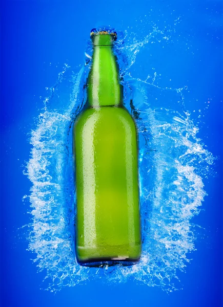 Beer bottle in water